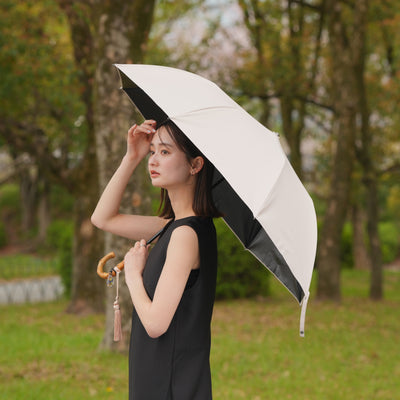 【日傘 utatane×Kuovi（クオヴィ）折りたたみ 日本製】100％遮光 2段55cm utataneくまちゃん＆果樹園 チャーム付  バンブーハンドル タッセル付 （2512639701）【ギフトキットB対応】