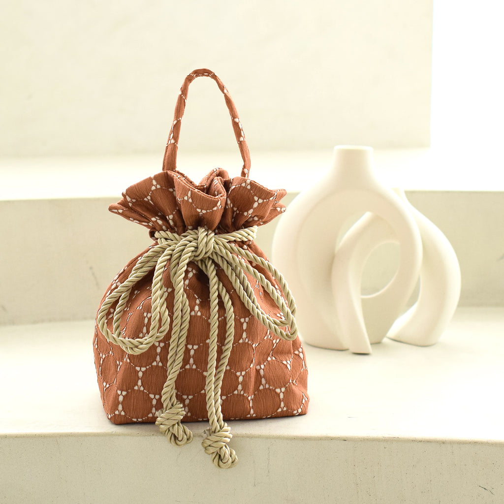 russet（ラシット）の「《Xmas Limited》巾着風ショルダーバッグ